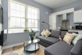 Arena Apartments - Stylish and Homely Apartments by the Ice Arena with Parking